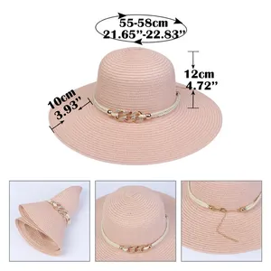 Detail view of foldable straw sun hat with 10cm wide brim and adjustable metal buckle