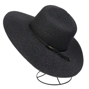 Close-up of the fine texture and breathable weave of this black wide brim straw hat