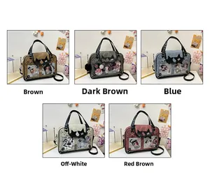 Detail view of ita bags in five colors with clear window and star shaped accents