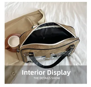 Top view of brown vintage PU leather ita bag showing spacious interior and zip pocket