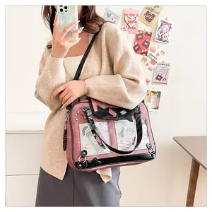 Pink Ita bag tote featuring a transparent PVC window with cute cartoon card decoration