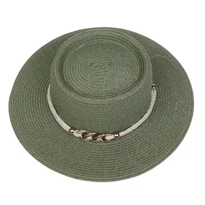 Detailed top view of moss green boater hat with woven texture and pearl chain band
