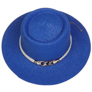 Close-up of royal blue straw boater hat with woven rope and metal chain detail