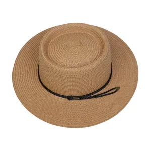 Detailed top view of brown woven straw hat showing spiral texture and black decorative cord