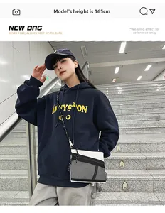 On-body view of a white mesh crossbody bag with black rope strap on a 165cm model