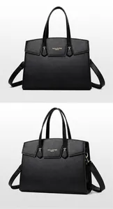Détail d'un sac à main en cuir grainé noir avec logo doré et fermoir métallique chic