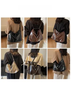 Tenues de mannequin montrant le grand sac cabas vintage en cuir verni de différentes couleurs