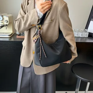 Minimalist black large capacity nylon hobo bag with vintage metal ring and brown charm