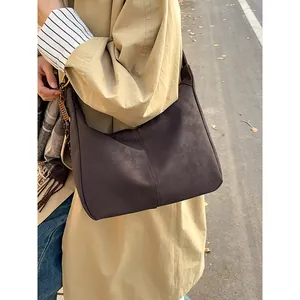 Retro dark brown oversized tote bag in faux suede leather for autumn casual styling