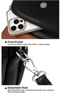 Detailansicht der schwarzen Ledertasche mit Litschi-Maserung, Reißverschluss und Haken