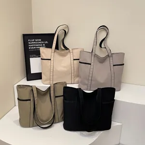 Minimalistische Multi-Pocket Segeltuch-Einkaufstaschen für Reisen und Alltag in vier Farben