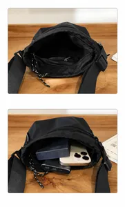 Detail view of nylon crossbody bag interior with large storage and zip pocket