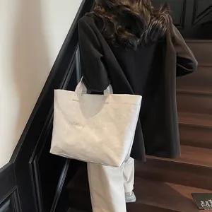 Minimalistische weiße DuPont-Papier-Tragetasche mit TOTE BAG Relieftext für Damen
