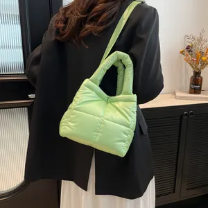 Chic light green quilted down tote bag with nylon finish for daily commuting and crossbody wear