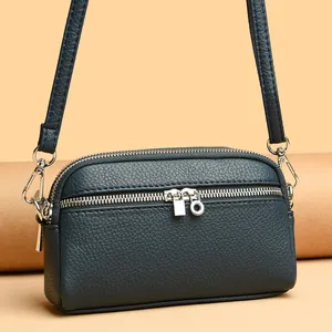 Sac bandoulière tendance en cuir bleu foncé à motif litchi avec double fermeture éclair