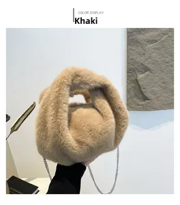 Detail of khaki plush bucket bag showing soft faux fur texture and metal chain strap