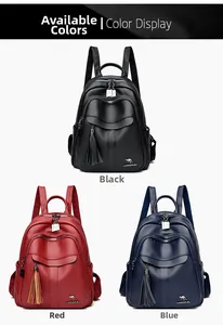 Three leather backpacks in black red and blue colors featuring tassels and kangaroo logo