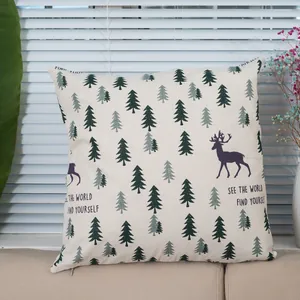 Detail of linen cushion cover with reindeer and forest print and hidden zipper