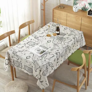 Detail van een rechthoekig katoen-linnen tafelkleed met vintage wereldkaart bedrukking