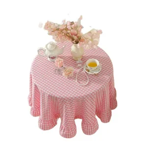 Pink and white checkered round tablecloth with ruffled edges for home dining decor