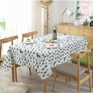 Nordic cotton linen tablecloth featuring green pine forest and reindeer patterns