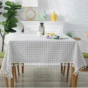 Nordic cotton linen tablecloth with blue checkered pattern and white tassels for dining