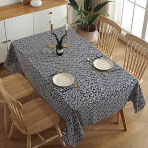 Close-up of classic blue and white seigaiha wave pattern tablecloth on a wooden table