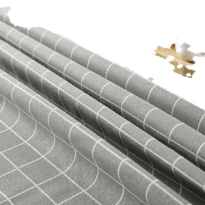 Modern minimalist grey and white checkered linen tablecloth with soft fabric texture