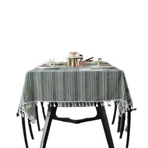 Bohemian rectangle tablecloth with green stripes, geometric patterns and white tassels