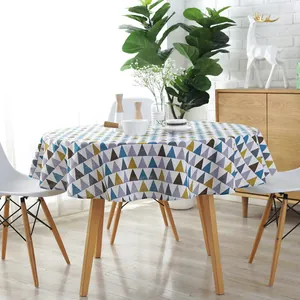 Detail of round cotton linen tablecloth with Nordic geometric triangle pattern