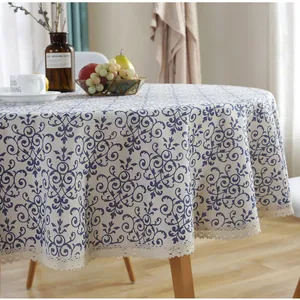 Round cotton linen tablecloth with blue vintage floral pattern and beige lace edge