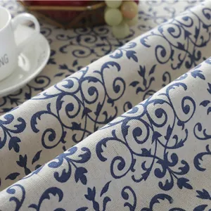 Detailed texture of blue vintage pattern linen tablecloth with decorative fringes