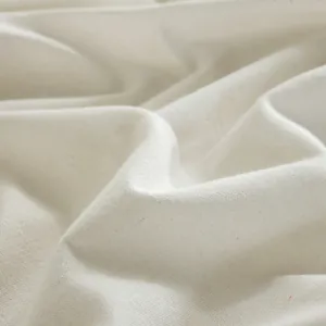 Detailed macro texture of off-white cotton linen fabric with high-quality weave