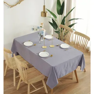 Detail view of solid lavender cotton tablecloth with natural fabric texture and soft drape