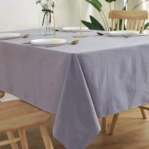Detail of lilac cotton tablecloth showing fine stitching and soft fabric texture