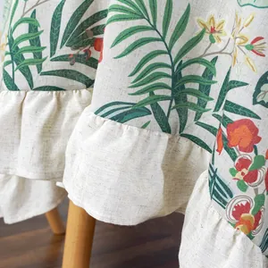 European vintage tropical palm leaf print tablecloth with elegant ruffled edges