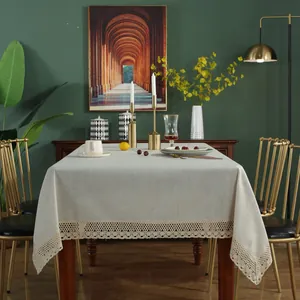 Nordic minimalist beige cotton linen tablecloth with elegant lace trim in a home setting