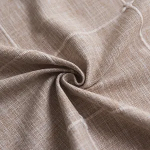 Macro-opname van Scandinavisch linnen tafelkleed met beige ruitvormig borduurwerk