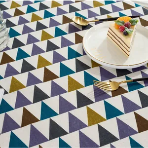 Close-up of geometric triangle pattern on high-quality linen blend Nordic tablecloth