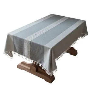 Tovaglia a righe grigie e bianche in cotone e lino con ricamo e bordo con nappe