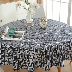 Close-up of a Nordic round cotton linen tablecloth with navy blue wave geometric patterns