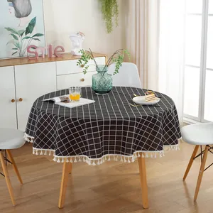 Nordic round tablecloth with black and white checkered pattern and cream tassel edges