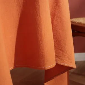 Orange cotton linen tablecloth with white stitched edges for Nordic style home decor