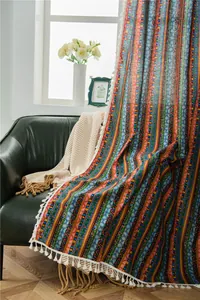 Detailed view of Bohemian cotton linen curtain featuring colorful stripes and fringe trim