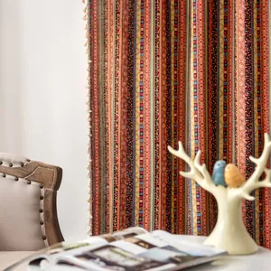 Bohemian multicolored striped cotton linen curtain with elegant side tassels in home setting