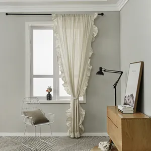 Detail of ruffled edge curtains in cream cotton linen fabric for Nordic home decor