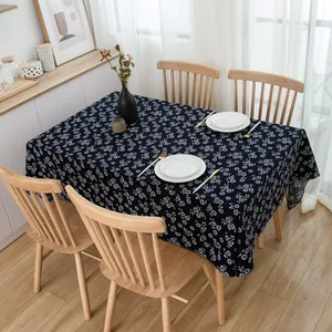 Close-up of retro blue batik style cotton linen tablecloth with floral pattern