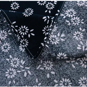 Blue and white floral cotton linen tablecloth featuring vintage batik style and stitched edge