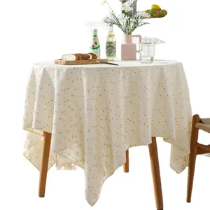 French country style cream round tablecloth with yellow polka dots and linen texture