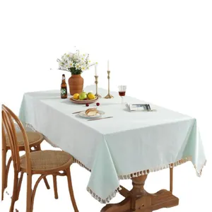 Nappe nordique en coton flammé vert menthe avec d'élégantes bordures à franges beiges